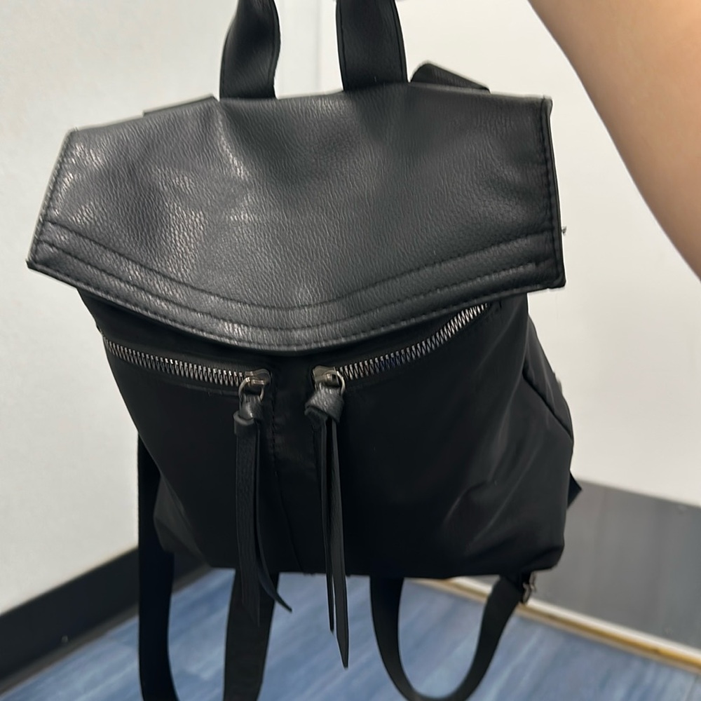 I am selling a black burlier New York backpack
